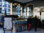Diners peruse the menu of the tiled oyster bar at Bibendum on Fulham Road London.