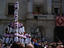 Celebrations underway for Festes de la Merce (Catalunya's National Day) with castellers (or human pyramid builders) on Placa Sant Jaume in Barri Gotic.