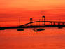 A firey red sunset over Newport Harbor.