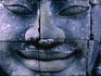 Close up of smiling face of Avalokiteshvara, Bayon, Angkor Thom.