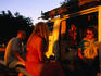 Travellers in combi van at sunset, Mindil Beach.