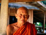 Portrait of a Buddhist monk in a village by the Mekong River.