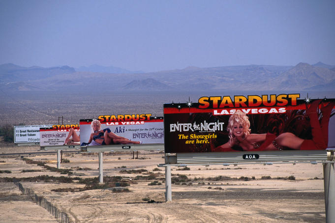 'Showgirl' billboards line the route between Califonia and Las Vegas.