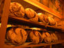 A large 'P' on breads made from the Poilane Bakery on Rue du Cherche-Midi.