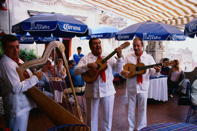 Mariachis of the modern kind catering to the tourist trade - Mexico City