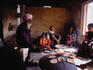 A group of worshippers cook chapatis in the kitchen of the Gurdwara Bara Sikh Temple in Kolkata.