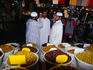 Discussing life, the universe and olives at a Damascus souq.